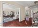 A well-lit home office with hardwood floors and neutral walls offers a flexible and productive workspace at 9 Water Stone Ct, Durham, NC 27705