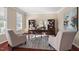 Bright and airy home office with large windows and ample workspace, ideal for remote work or study at 9 Water Stone Ct, Durham, NC 27705
