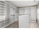 Spacious walk-in closet with ample shelving and hanging space for organized storage at 9 Water Stone Ct, Durham, NC 27705