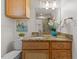 Bathroom boasting granite counters, stylish decor, and ample natural light at 901 Emory Ln, Raleigh, NC 27609