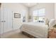 Cozy bedroom with two windows letting in lots of natural light at 922 Tupelo Glen Ct, Fuquay Varina, NC 27526