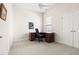 Office space with desk, chair, and double door closet at 922 Tupelo Glen Ct, Fuquay Varina, NC 27526