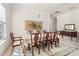 Elegant dining room featuring a large table, chandelier, and traditional decor at 922 Tupelo Glen Ct, Fuquay Varina, NC 27526