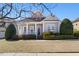 Charming single-story home featuring a cozy front porch and well-maintained landscaping at 922 Tupelo Glen Ct, Fuquay Varina, NC 27526