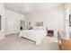 Large bedroom featuring neutral colors and an adjacent bath and walk-in closet at 922 Tupelo Glen Ct, Fuquay Varina, NC 27526