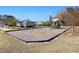 Community playground with swings and play equipment at 922 Tupelo Glen Ct, Fuquay Varina, NC 27526