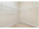 Spacious walk-in closet with wire shelving for organized storage solutions at 922 Tupelo Glen Ct, Fuquay Varina, NC 27526