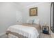 Cozy bedroom with a comfortable bed and a side table with a lamp at 101 Maroon Ct, Raleigh, NC 27610