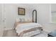 Charming bedroom with soft lighting, stylish decor, and decorative pillows at 101 Maroon Ct, Raleigh, NC 27610