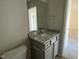 Bathroom featuring granite countertop, gray vanity and chrome towel rack at 102 Heatherglenn Cir, Princeton, NC 27569