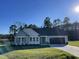 Beautiful single-story home with a well-manicured lawn, attached garage and inviting entryway at 102 Heatherglenn Cir, Princeton, NC 27569