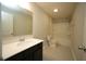 Bathroom featuring a vanity with mirror, tub and shower combination, and a toilet at 110 Manor Stone Dr, Clayton, NC 27527