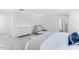 A well appointed bedroom featuring a large comfortable bed and a cozy chair at 1129 Sun Springs Rd, Wake Forest, NC 27587