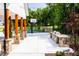 Enjoy an outdoor kitchen and entertainment area with a basketball court and tennis court at 1129 Sun Springs Rd, Wake Forest, NC 27587