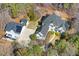 This aerial shot highlights the home, detached garage and RV parking on the grounds at 113 Valley Ln, Pittsboro, NC 27312