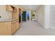 Basement bar and storage area with built in shelving at 113 Valley Ln, Pittsboro, NC 27312