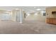 Spacious carpeted basement with recessed lighting and finished walls, offering versatile space at 113 Valley Ln, Pittsboro, NC 27312