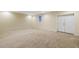 Unfinished basement with carpeted flooring and painted white walls at 113 Valley Ln, Pittsboro, NC 27312