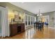 Dining area with a buffet cabinet and large windows overlooking the backyard at 113 Valley Ln, Pittsboro, NC 27312