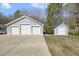 Three-car garage with ample parking space and storage at 113 Valley Ln, Pittsboro, NC 27312