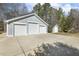 Attached three-car garage and additional matching detached garage at 113 Valley Ln, Pittsboro, NC 27312