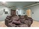 Spacious home theater with comfortable seating and dim lighting at 113 Valley Ln, Pittsboro, NC 27312