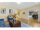Spacious living room with hardwood floors that leads to a kitchen and dining area at 113 Valley Ln, Pittsboro, NC 27312