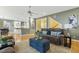 Inviting living room with an open floor plan, leading to a modern kitchen and staircase at 113 Valley Ln, Pittsboro, NC 27312