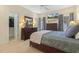 Comfortable main bedroom with a ceiling fan, flatscreen TV, and outdoor views at 113 Valley Ln, Pittsboro, NC 27312