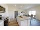 Modern kitchen with stainless steel appliances, granite countertops, and island seating at 1140 Centerview Drive, Nashville, NC 27856