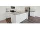 Well-equipped kitchen with granite countertops, stainless steel appliances, and a functional island at 1140 Centerview Drive, Nashville, NC 27856
