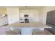 Stylish kitchen featuring a granite island, stainless steel appliances and ample cabinet space at 1140 Centerview Drive, Nashville, NC 27856