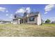 Charming single-Gathering home with manicured lawn, stylish siding, and attached garage at 115 S Harper Faith Way, Benson, NC 27504