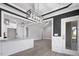 Open-concept living and dining rooms featuring a kitchen island at 115 S Harper Faith Way, Benson, NC 27504