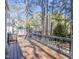 View of back of house with back deck at 116 Lakeshore Dr, Durham, NC 27713