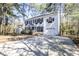 Charming two-story home with black shutters and a long driveway at 116 Lakeshore Dr, Durham, NC 27713