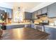 Well-appointed kitchen featuring a large island, stainless appliances, and ample cabinets at 116 Lakeshore Dr, Durham, NC 27713