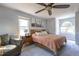 Cozy main bedroom with a comfortable bed, and windows for plenty of light at 116 Lakeshore Dr, Durham, NC 27713