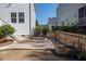 A view of the home's backyard that features a privacy fence, patio and garden at 117 Gravel Brook Ct, Cary, NC 27519