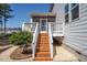 Wooden backyard deck that leads to the screened porch at 117 Gravel Brook Ct, Cary, NC 27519