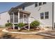 A view of the home's backyard that also includes a screened porch at 117 Gravel Brook Ct, Cary, NC 27519