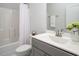 Cozy bathroom featuring a toilet, sink, vanity, shower and bathtub at 117 Gravel Brook Ct, Cary, NC 27519