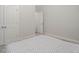 Clean bedroom with a modern bed, and an expansive neutral colored carpet at 117 Gravel Brook Ct, Cary, NC 27519