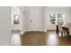 Bright foyer with hardwood floors, white walls, and natural light at 117 Gravel Brook Ct, Cary, NC 27519