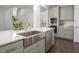 Modern kitchen with stainless steel appliances and a large center island at 117 Gravel Brook Ct, Cary, NC 27519