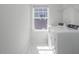Well lit laundry room with a washer and dryer at 117 Gravel Brook Ct, Cary, NC 27519