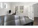 Cozy room with a piano, desk, and comfortable gaming chair at 117 Gravel Brook Ct, Cary, NC 27519