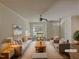Bright, virtually staged living room with hardwood floors and neutral décor at 11700 Coppergate Dr # 105, Raleigh, NC 27614