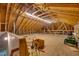 The spacious attic showcases wood beams, natural light, and potential for custom renovation at 119 Cardinal Crest Ct, Pittsboro, NC 27312