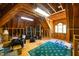 The spacious attic presents exposed wood and natural light, perfect for converting into a bonus room at 119 Cardinal Crest Ct, Pittsboro, NC 27312